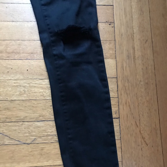Uniqlo black skinny jeans with ripped knees - Picture 2 of 3